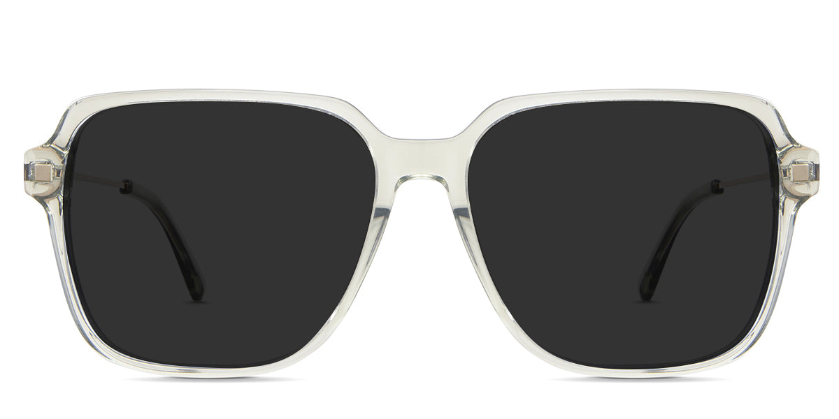 Elma black tinted Standard Solid sunglasses in noisette variant - it's a square transparent frame with an acetate rim and metal temple arm.
