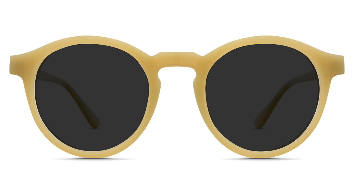Geo black tinted Standard Solid sunglasses in the canary variant - have a circular frame with an extended square end piece and a round viewing lens shape.