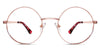 Larsen prescription glasses in cyclamen variant - it's round wired frame in pink metal colour - medium size frame with nose pads Metal eyeglasses