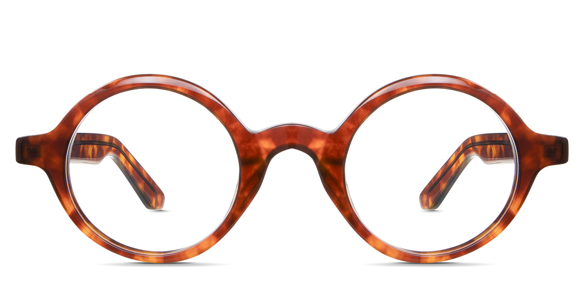 Nexo eyeglasses in hodori variant - it's a round acetate frame with a tortoise pattern.
