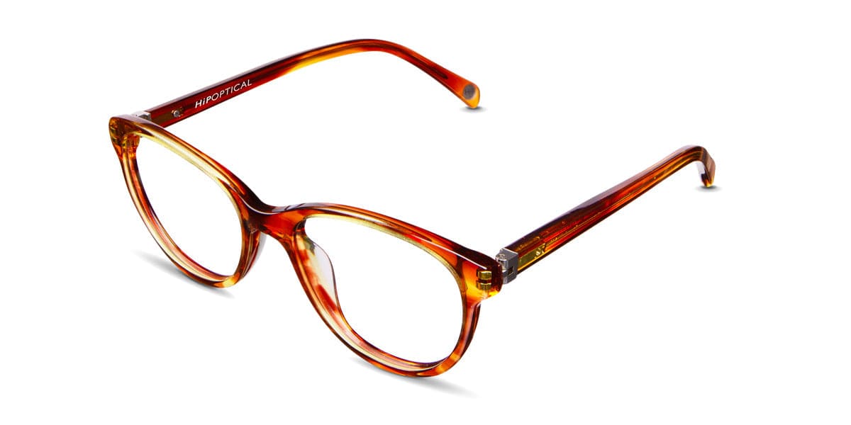 Roth Jr frame in sunny field variant - oval shape in brown and orange colours - it has thin arms written hip optical on it